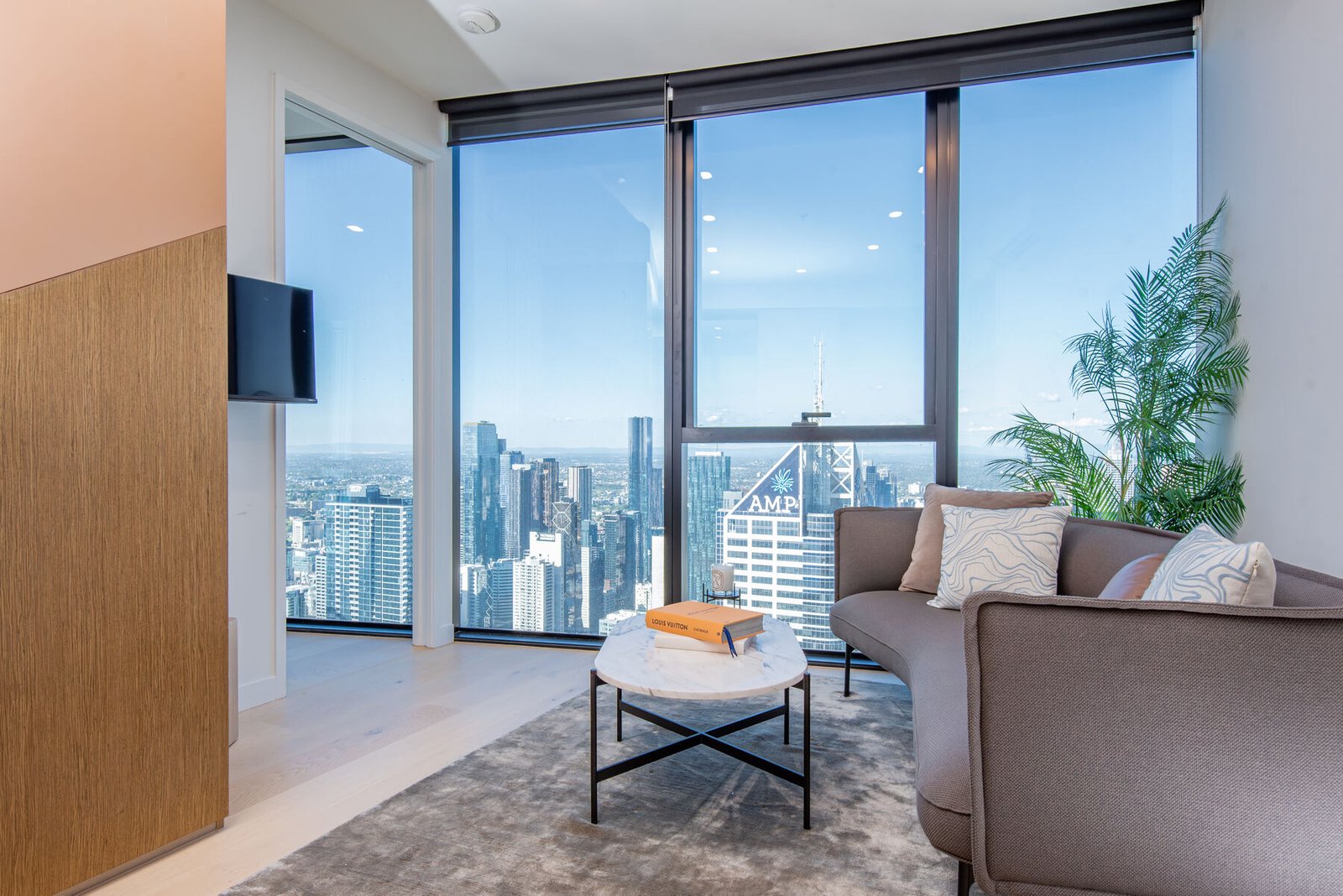 Skyloft living room with Melbourne skyline view