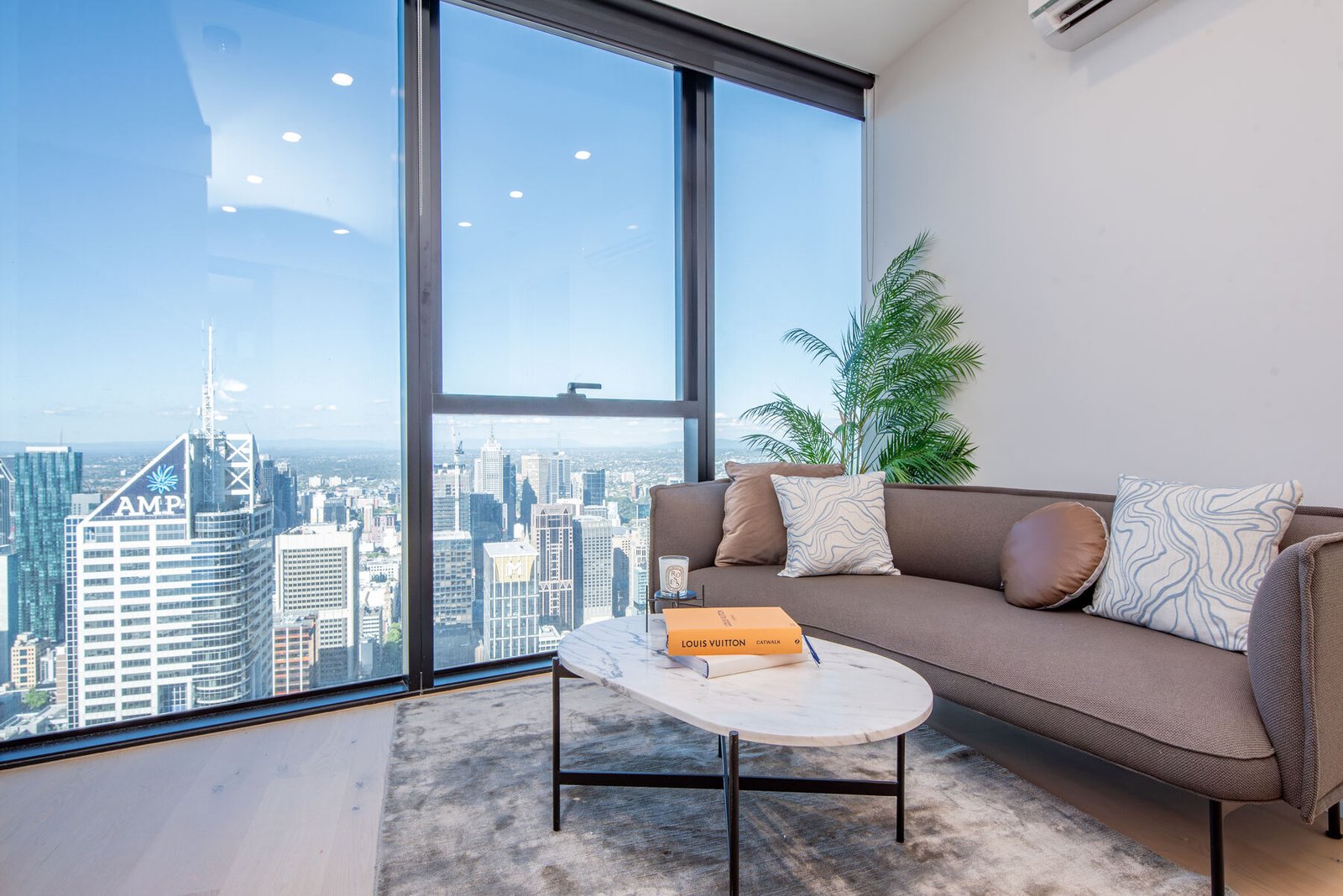 Skyloft apartment lounge with skyline